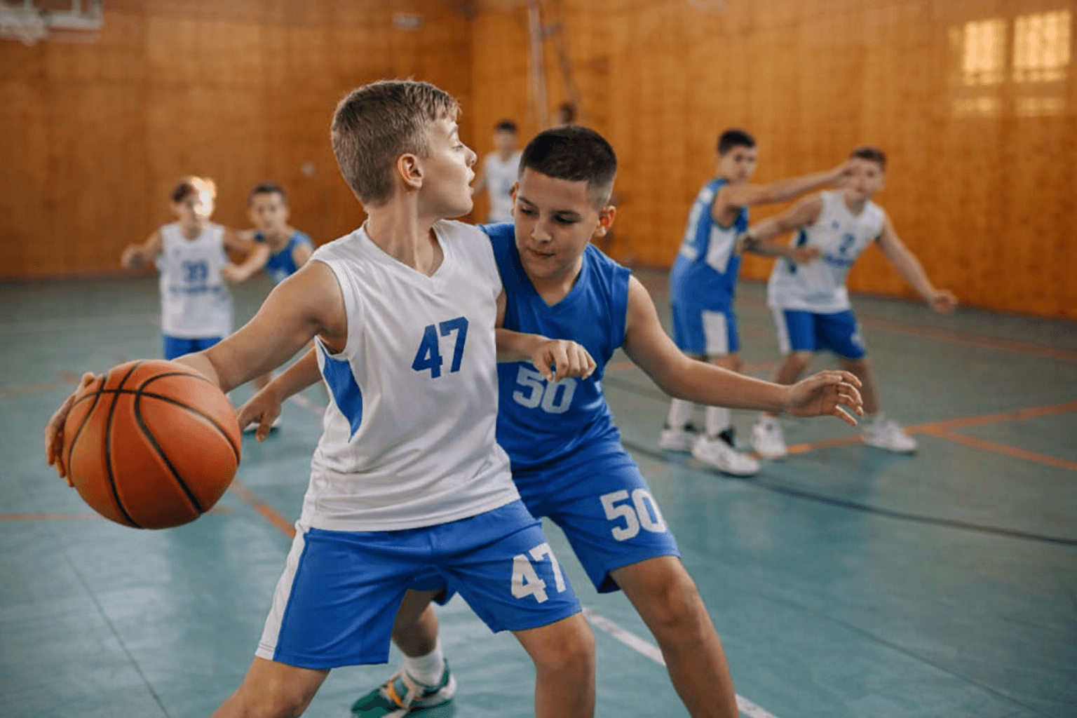 Young athletes playing basketball